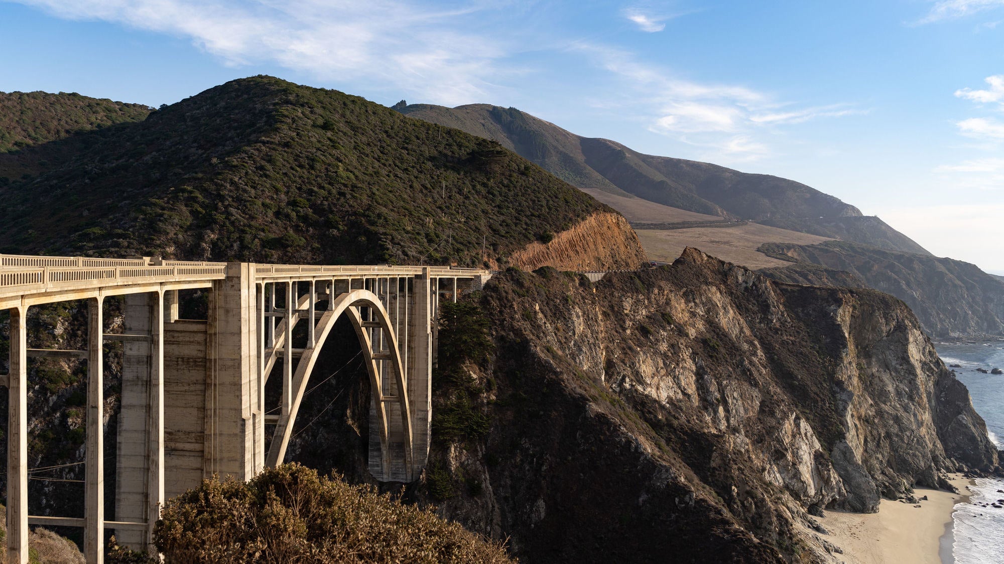 Bixby Bridge arching over a rocky cove on Highway 1 through Big Sur